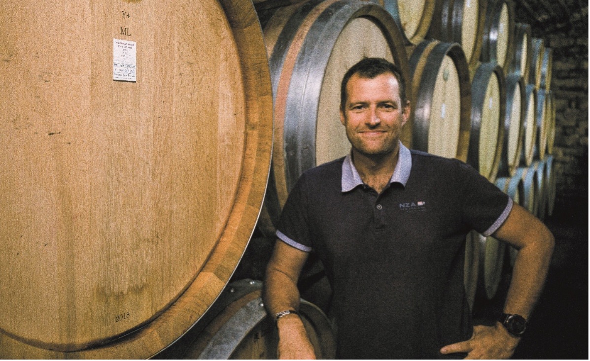 Laurent Fournier of Domaine Jean Fournier standing in a Bourgogne vineyard, a key producer behind the modern revival of Aligoté wine.